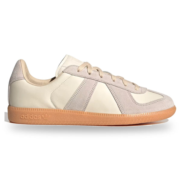 Beige Adidas sneaker with brown sole on a white background