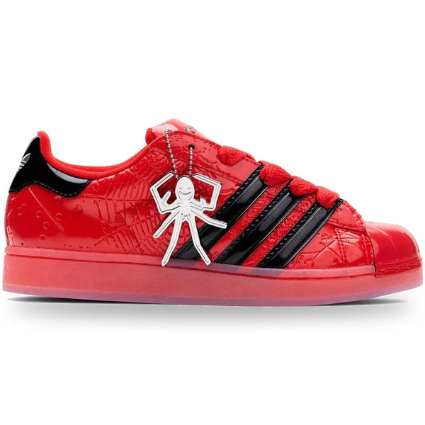 Red and black sneaker with a spider design on a white background