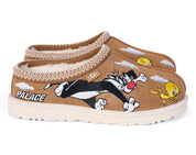 Brown slippers with cartoon characters and 'Palace' branding on a white background
