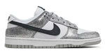 Silver glittery sneaker with black swoosh logo on a white background - Image 1