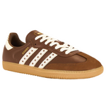 Brown Adidas sneaker with white stripes on a white background - Image 2