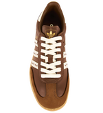 Brown Adidas sneaker with white laces on a white background - Image 4