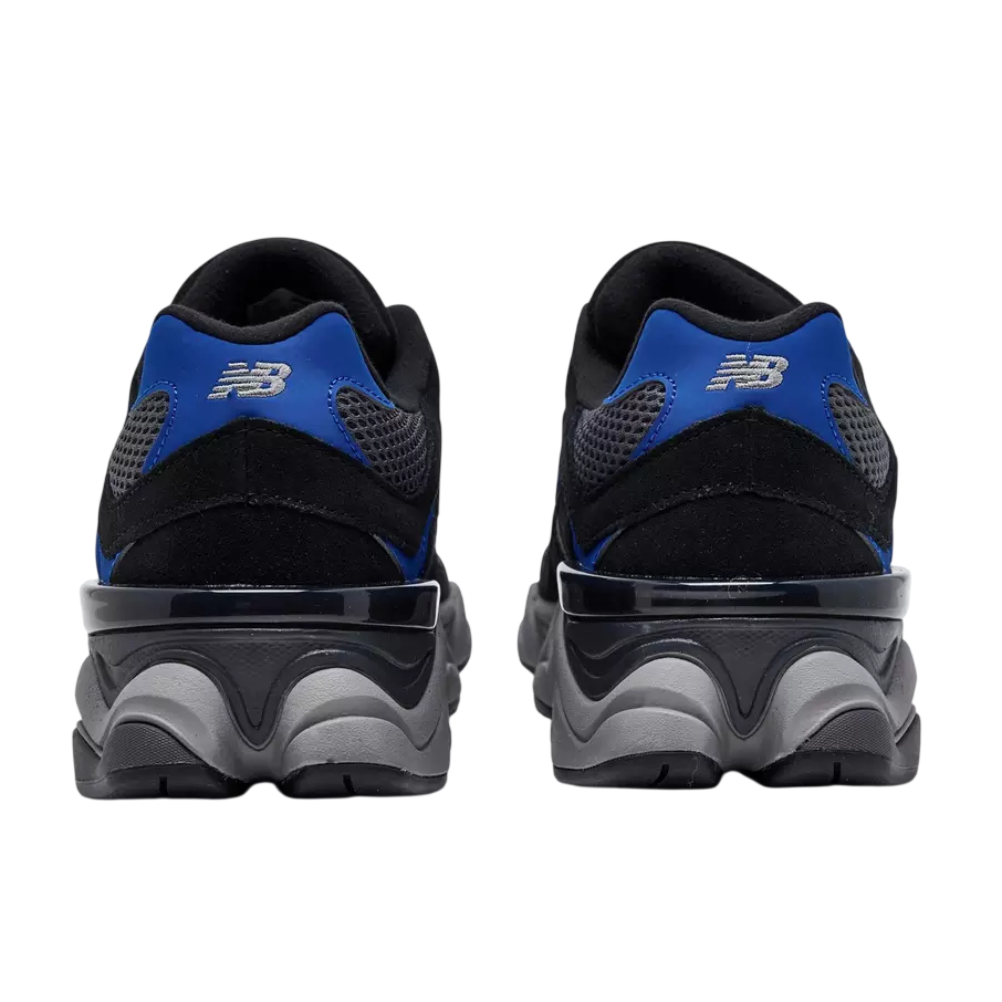 Black and blue athletic shoes with New Balance logo on a white background
