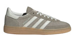 Gray Adidas sneaker with white stripes on a light gray background - Image 1