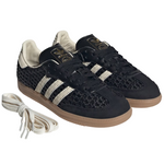 Black Adidas sneakers with white laces on a white background - Image 2