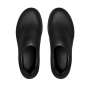 Pair of black slippers on a white background