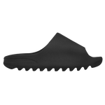 Black slip-on shoe with sole texture on a white background - Image 1