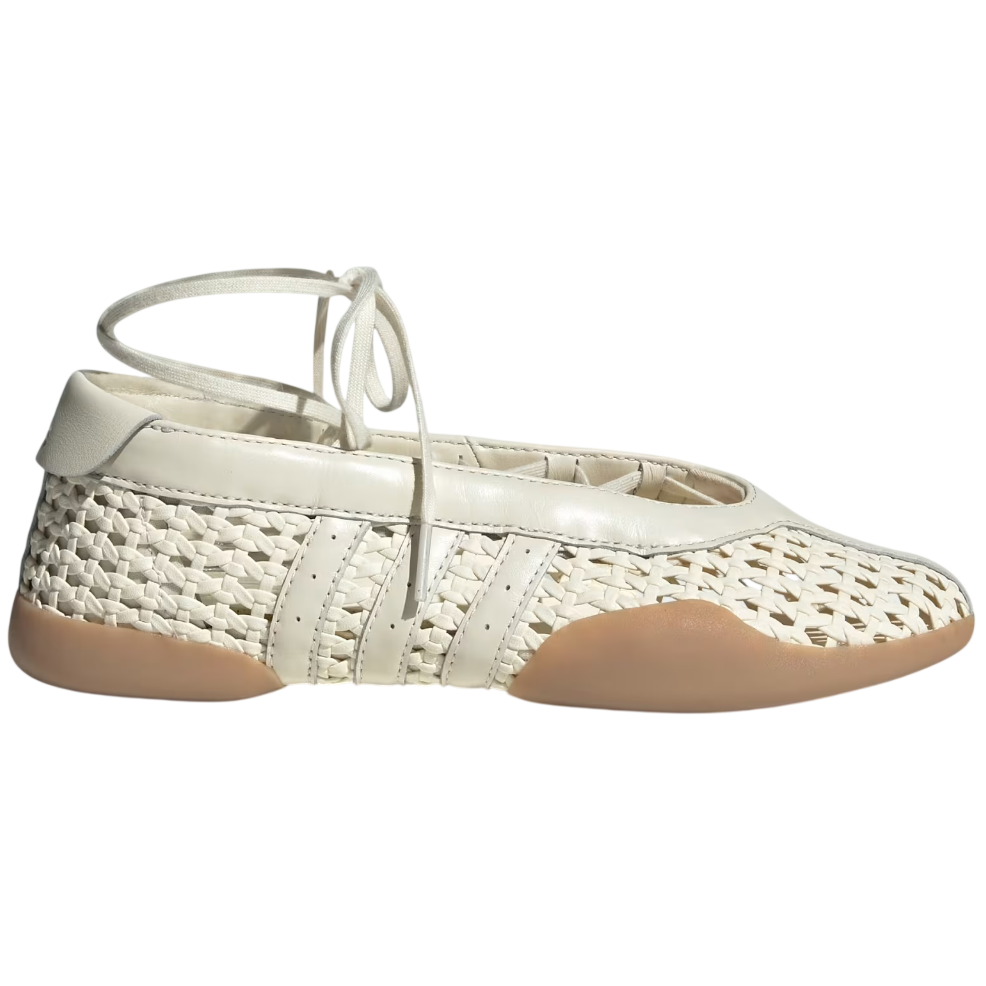 White woven shoe with tan insole on a white background
