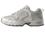 Gray athletic shoe with New Balance logo on a white background - Image 3