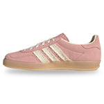 Pink Adidas sneaker with three white stripes on a light gray background - Image 3