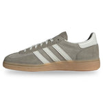 Gray Adidas sneaker with white stripes on a light gray background - Image 3