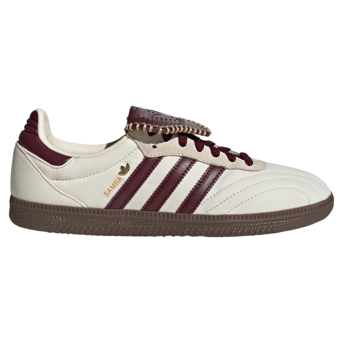 White and burgundy Adidas sneaker on a white background