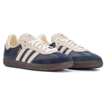 Pair of navy and white sneakers with three stripes on a white background - Image 2