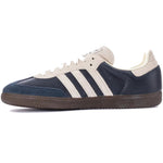 Navy and white sneaker with three stripes on a white background - Image 3