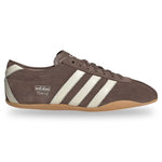 Brown Adidas sneaker with white stripes on a white background - Image 1
