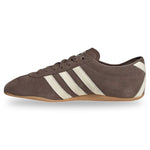 Brown sneaker with white stripes on a white background - Image 3