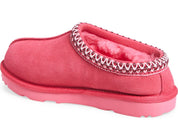 Pink slipper with decorative trim on a white background