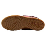 Close-up of a brown sneaker sole with brand logo on a white background - Image 4