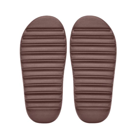 Pair of brown slippers on a white background