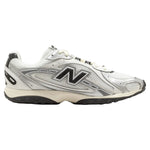 White New Balance sneaker with black logo on a white background - Image 1