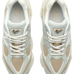 Pair of white sneakers with heart patterns on a white background - Image 4
