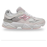 White sneaker with pink accents on a white background - Image 1