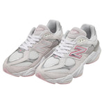 Pair of light gray sneakers with a pink logo on a white background - Image 2