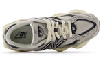 Gray and white sneaker with New Balance logo on a white background - Image 4