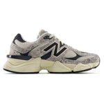 Gray and beige sneaker with black accents on a white background - Image 1