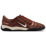 Brown athletic shoe with Nike logo on a white background - Image 1