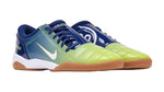 Pair of blue and green sports shoes on a white background - Image 2