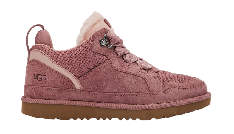 Pink UGG sneaker with brown sole on a white background